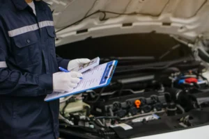 mechanic-inspecting-vehicle-with-checklist-for-rep-2026-01-07-01-49-39-utc
